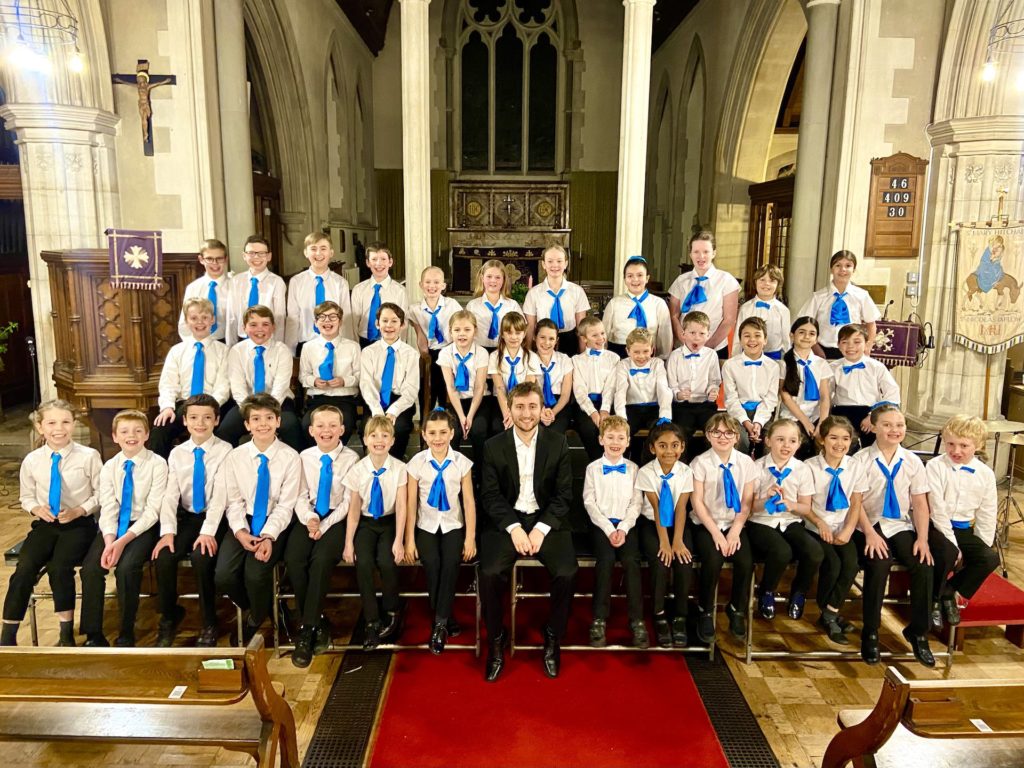 Ben de Souza sat with choirs